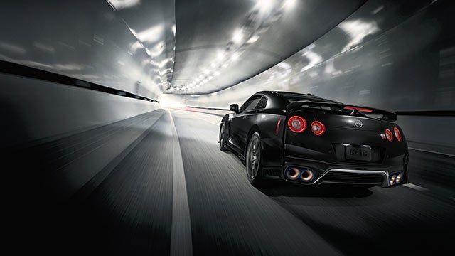 2023 Nissan GT-R seen from behind driving through a tunnel | Greeley Nissan in Greeley CO